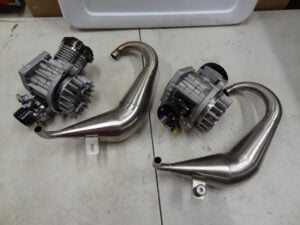Used Primal RC Raminator 49cc Engines with Pipes (2)