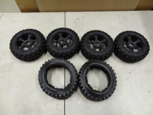 New Buggy front wheels w/ excavator tires (4), 2x AT tires, all new