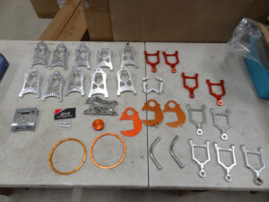 Used Rovan, King Motor Baja arms, aluminum mounts, spur gear plates, beadlock rings, misc. good condition