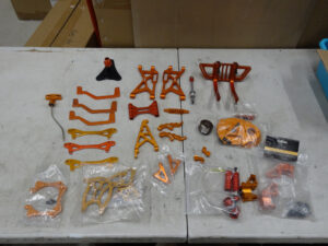Used Rovan KM Baja 5B aluminum parts, some like new and some scratched parts