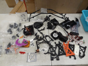 Used Rovan KM Baja 5B parts, nice upgrades, arms, drive shafts, pull start, body pieces
