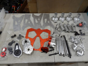 Used Primal RC V1-2 Raminator Frame, axle tubes, trans, diff, and misc parts, all used, scratches