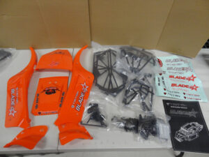 Baja Triton Blade 5B roll cage kit, orange panels, mostly complete, used panels, light scratches