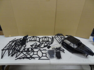 Plastic cage for Baja 5B, black panels, extra parts included, scratch + dent